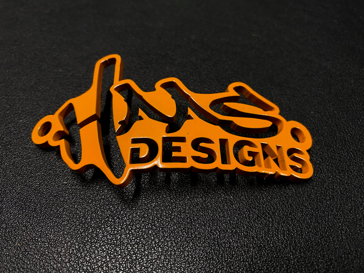 Melon Orange Haas Designs Emblem